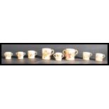 A group of eight Royal Worcester ivory blush minia