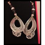 A pair of floral drop earrings set with freshwater