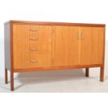 A 1960's mid Century teak wood sideboard having a