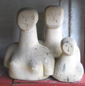 An abstract carve Bath stone sculpture of three bu