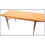 A 1970's Danish inspired teak wood dining table be