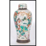A 19th century Chinese crackle glazed vase urn depicting scenes of warriors in battle. Brown