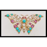 A vintage hallmarked 9ct gold opal, ruby and turquoise brooch in the form of a butterfly. Makers HBJ