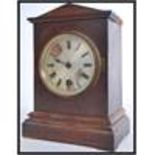 A 19th century English mantel clock - bracket clock with 24 hr movement, silvered dial in oak
