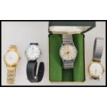 A group of three vintage watches to include a Tissot 9ct gold metal core, Ingersoll Shockproof and a