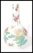 A fine Chinese porcelain bottle vase of baluster form with hand enamelled decoration of butterfly