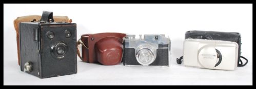 A vintage 20th century cased Cornet 5 35mm camera together with a vintage cased Brownie Junior and