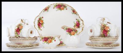 A Royal Albert six person Old Country Roses tea set, consisting of six cups, saucers and side