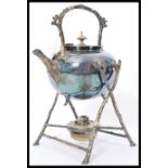 A 19th century Victorian silver plated spirit burner picnic kettle by Fenton Brothers. Raised on