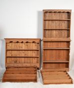 A country pine bookcase together with a hanging pine shelf with spice drawers, a hanging pine