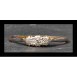 A Henry Griffith and Son 18ct gold and platinum th