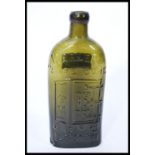 WARNERS SAFE CURE BOTTLE. 9.25ins tall, bright green glass embossed WARNERS/ SAFE CURE/ LONDON