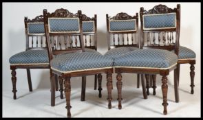 A set of 6 newly upholstered Victorian mahogany dining chairs being raised on ring turned legs