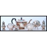 A group of silver plated items to include a tea service, teapot, butter dish etc. Please see
