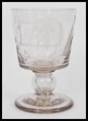 An 1838 19th Century Victorian oversized wine glass / rummer. Stunning etched floral decoration with