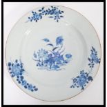 An 18th century Chinese Quinlong period plate having hand painted blue and white decoration of