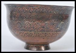 An 18th century Persian Islamic Middle Eastern prayer bowl constructed from two joined pieces of