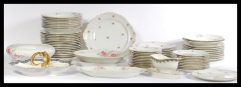 A large group of French Limoges ceramic dinner pla