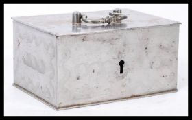 An 18th century Georgian steel strong box having handle to lid. The hinged lid opening to reveal a