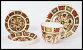 A Royal Crown Derby Imari pattern cabinet tea / coffee cup and saucer ( 1128 ) together with a