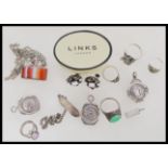 A group of sterling silver jewellery to include ingot pendants, banded agate pendant, silver