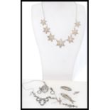 A group of vintage silver filigree and marcasite jewellery to include filigree flower star necklace,