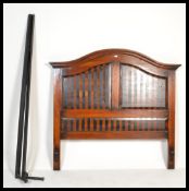 A large Victorian style hardwood and ebony inlaid double bed. Each headboard with ebony tramlines.