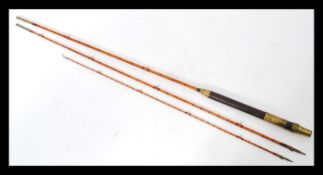 An early 20th Century Farlows of London the Elf split cane trout fly rod, in three sections, with