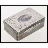 A 19th century silver white metal vinaigrette / pill box of rectangular form having chased