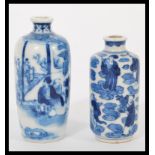 Two 19th century Chinese blue and white snuff bottles/ vases having hand painted decoration of