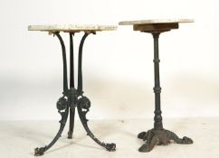 2 cast iron and marble garden pedestal tables. Each with cast iron painted bases, one with dolphin