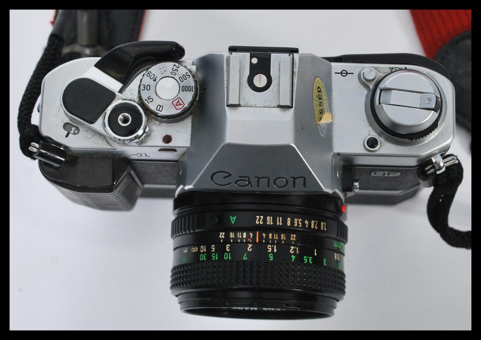 A vintage 1983 Canon AL-1 SLR Camera complete with authentic Canon neck ...