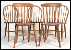 A pair of Victorian lathe back beech and elm windsor dining chairs together with a set of 3