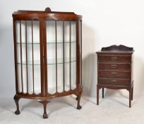 An Edwardian mahogany pedestal music cabinet with 4 drawers raised on squared legs together with a