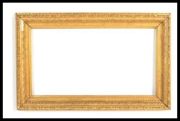 A 19th century Victorian large gilt frame having Greek key borders with acanthus leaf decoration.