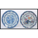 Two 19th century Chinese plates both having blue and white decoration, one having coloured
