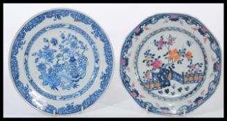 Two 19th century Chinese plates both having blue and white decoration, one having coloured