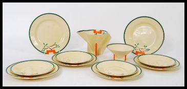 Clarice Cliff for Newport Pottery -  a collection of items in the Ravel pattern to include conical