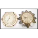 A vintage mid century retro Metamec sunburst clock along with a vintage Zodiac clock. Please see