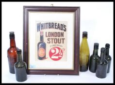 A collection of six vintage early 20th Century beer bottles, each with notation / advertising to the