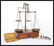 A rare unusual set of 19th century double / twin Chemist weighing scales with two sets of scales