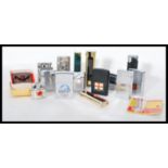 A collection of vintage cigarette lighters to include Ronson, Penguin, faux shagreen etc. Please see