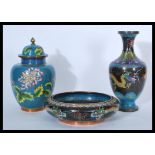 A group of three early 20th century cloisonne wares to include lidded vase, baluster vase and