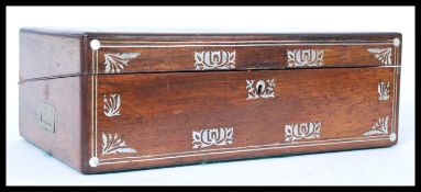 A 19th century Victorian rosewood and mother of pearl inlaid writing slope box. The box  having