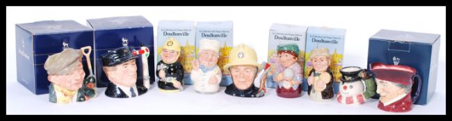 A group of Royal Doulton character jugs to include Snowman Xmas Robin, The Fireman 1300/5000, Engine