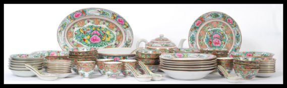 An extensive early to mid 20th Century Chinese service / crockery set with hand painted details,