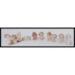A group of Nao ( LLadro ) cherubs figurines in various poses. All stamped for Nao. (10) Measures