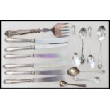 A group of silver hallmarked and silver handled flatware / cutlery to include a set of six knives,