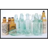 A collection of Bristol related glass lemonade and stoneware ginger beer bottles to include R.