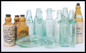 A collection of Bristol related glass lemonade and stoneware ginger beer bottles to include R.